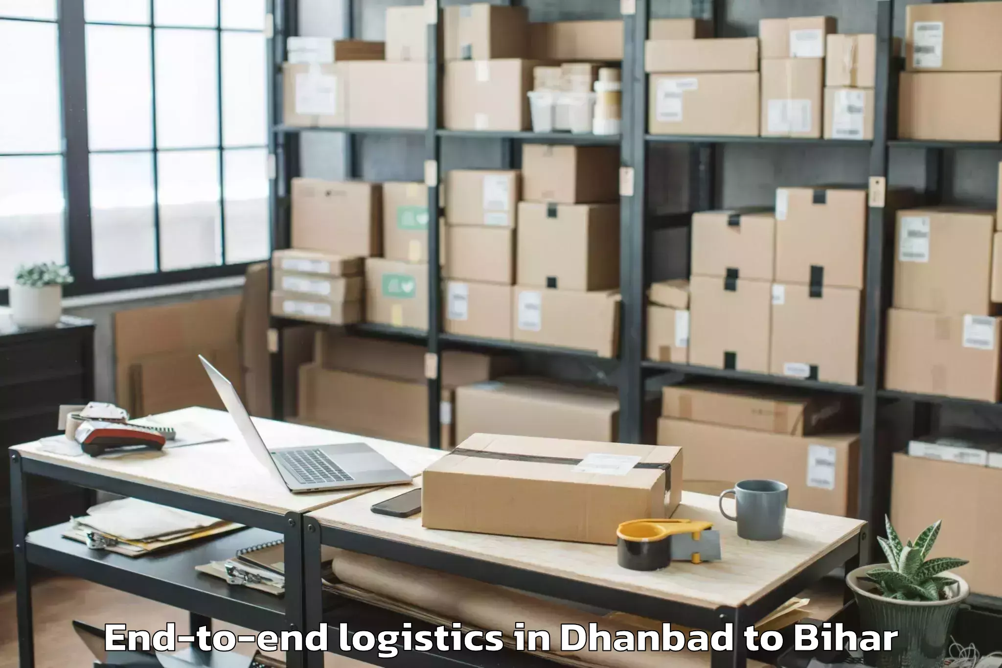 Reliable Dhanbad to Lauria Nandangarh End To End Logistics